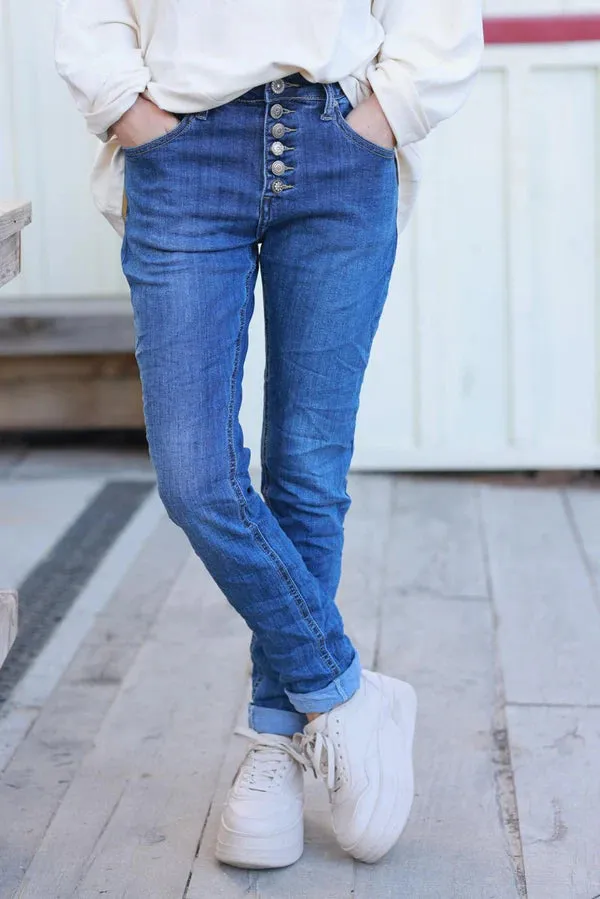 Medium Wash Button-Fly Tapered Skinny Jeans