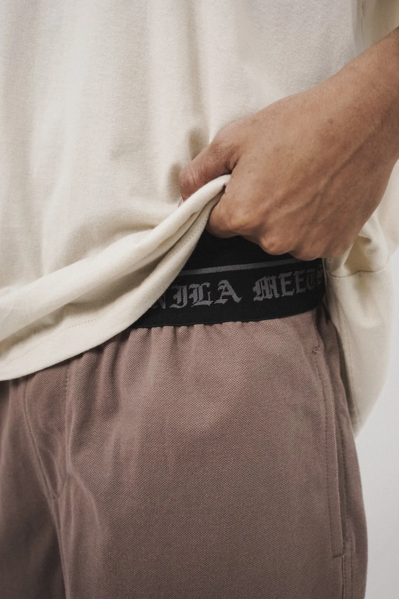 TRAINING SHORTS IN MAUVE
